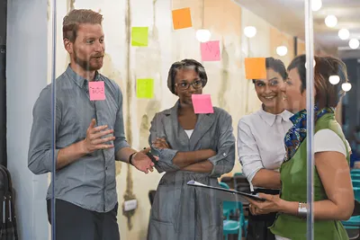 The team ideating with sticky notes